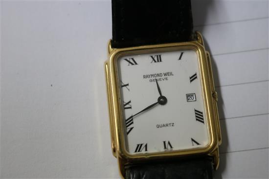 A ladys gold Rolex Precision watch and two other watches.